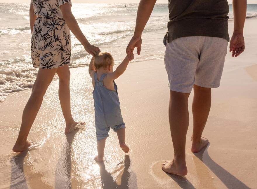 Nigel and Trisha on the beach at sunset